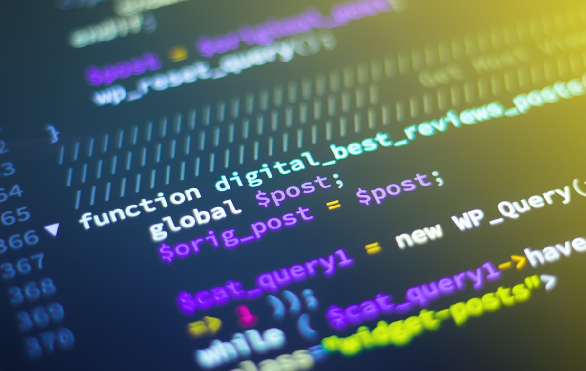 Close-up of source code on a monitor, used as a visual reference for AI security analysis.